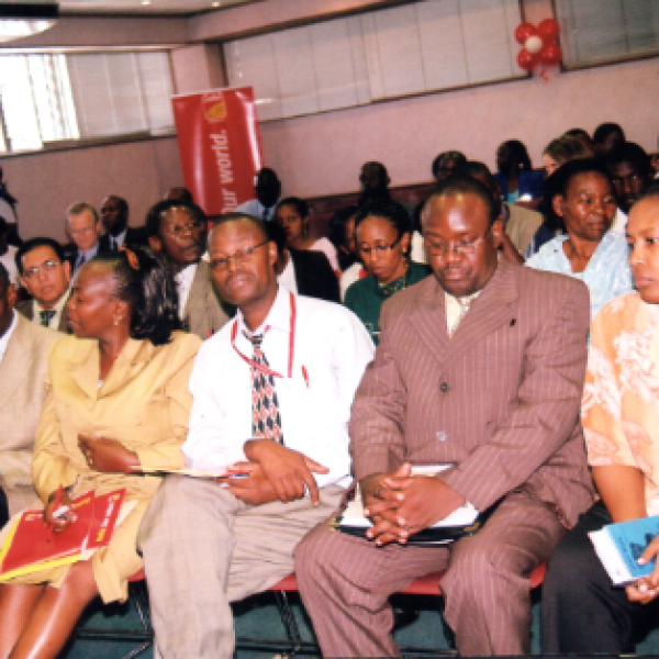 Delegates follow proceedings