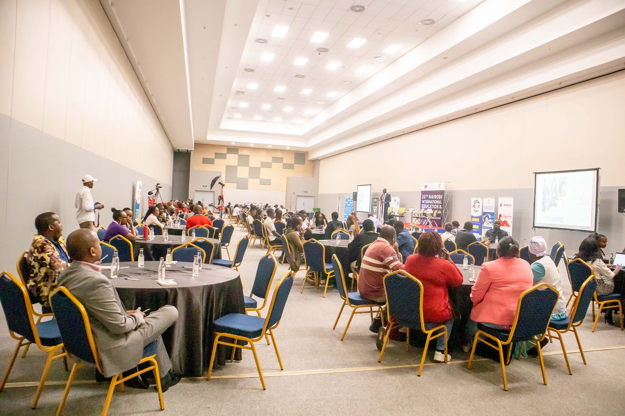 Delegates follow proceedings